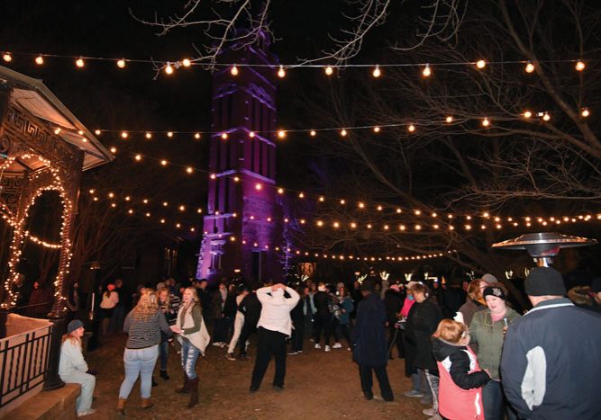 Revelers gather at the Historic Belltower in Downtown Salisbury to ring in the New Year of 2018. JON C. LAKEY / SALISBURY POST Revelers gather at the Historic Belltower in Downtown Salisbury to ring in the New Year of 2018. Sunday, December 31, 2018, in Salisbury, N.C.